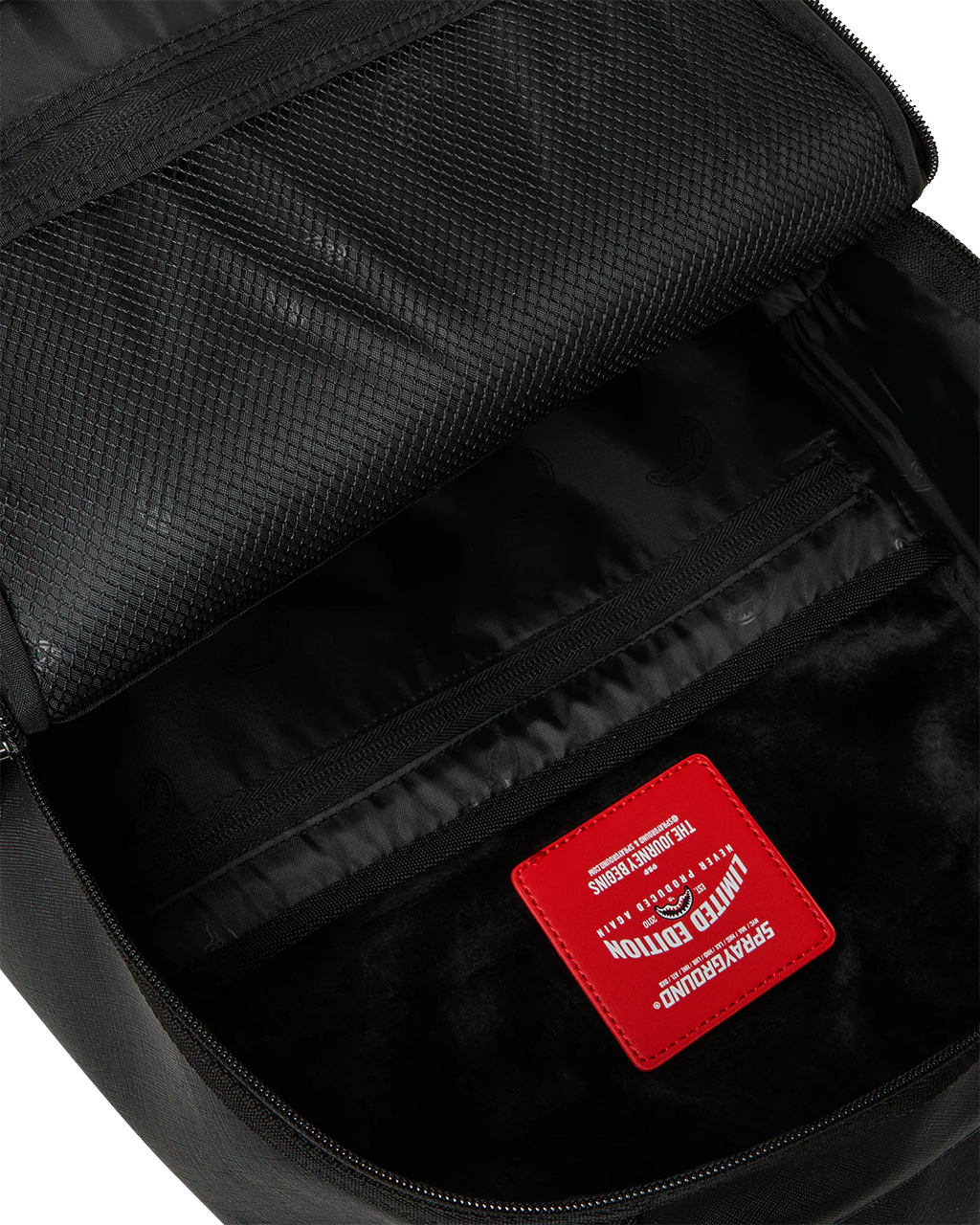 BLACKED OUT EMBOSSED GOLD TOOTH BACKPACK