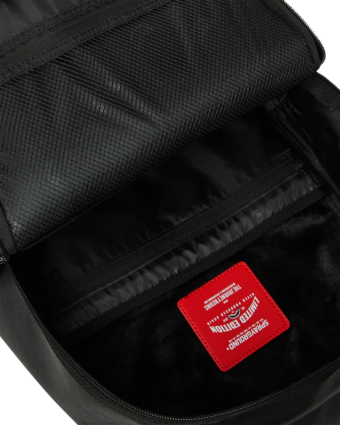 BLACKED OUT EMBOSSED GOLD TOOTH BACKPACK