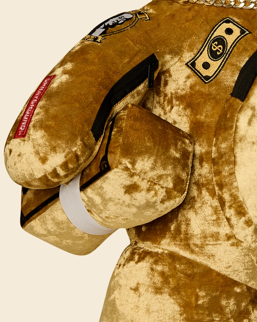 SHARKS IN PARIS GOLD DRIP MONEYBEAR BACKPACK